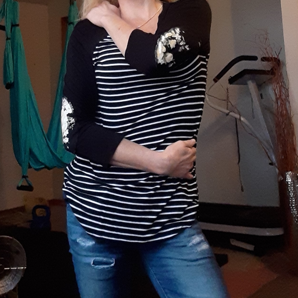 Chris and Carol long sleeved striped floral elbow patches